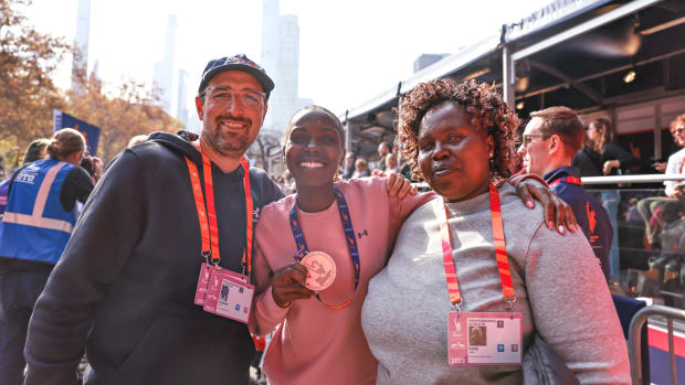 Sharon Lokedi smiles after the 2023 New York City Marathon.